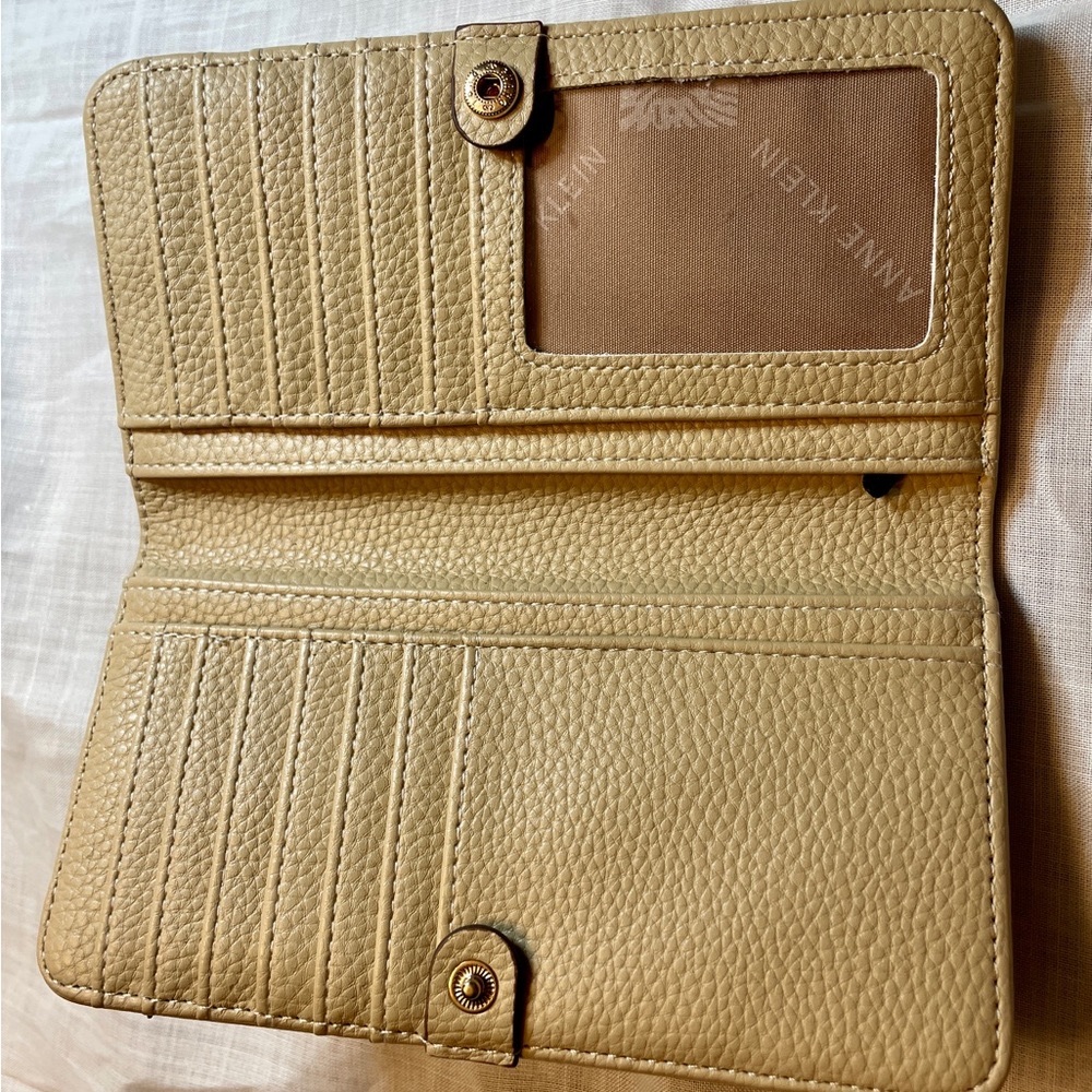 Anne Klein Slim creamy yellow Bifold Wallet. THIS ITEM HAS BEEN SOLD